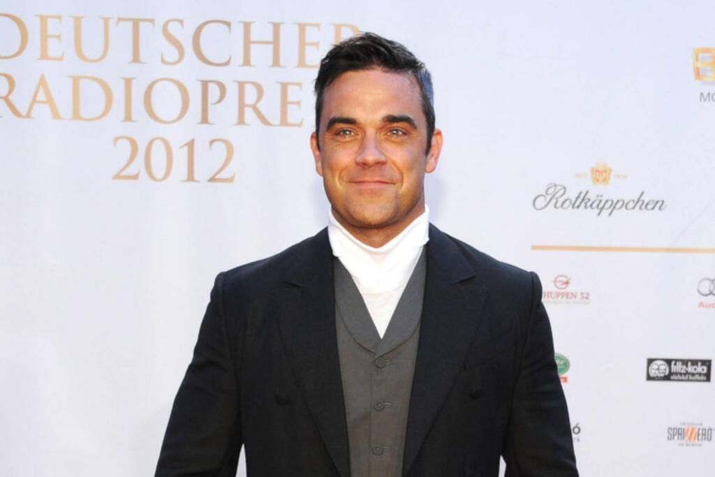 Un primo piano di Robbie Williams